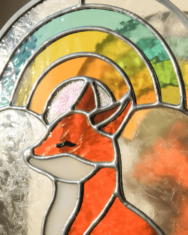 Basile le renard sous l’arc en ciel 