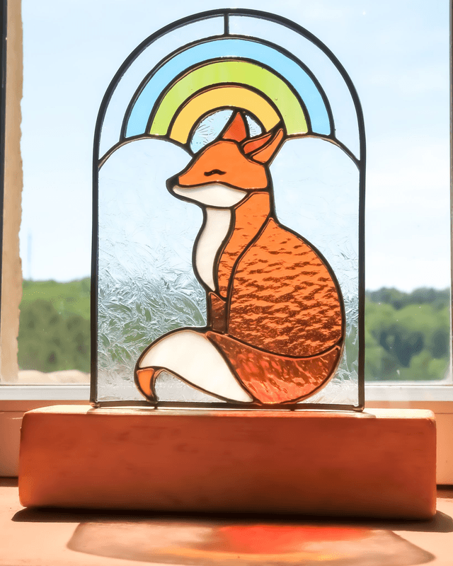 Basile le renard sous l’arc en ciel 