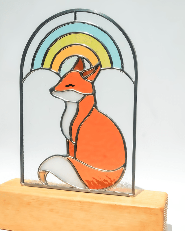 Basile le renard sous l’arc en ciel 