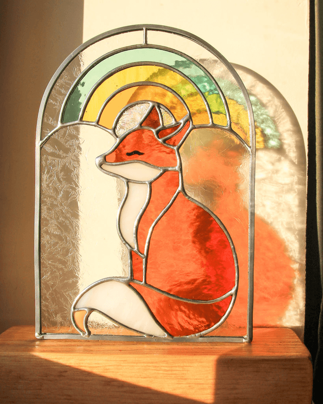 Basile le renard sous l’arc en ciel 